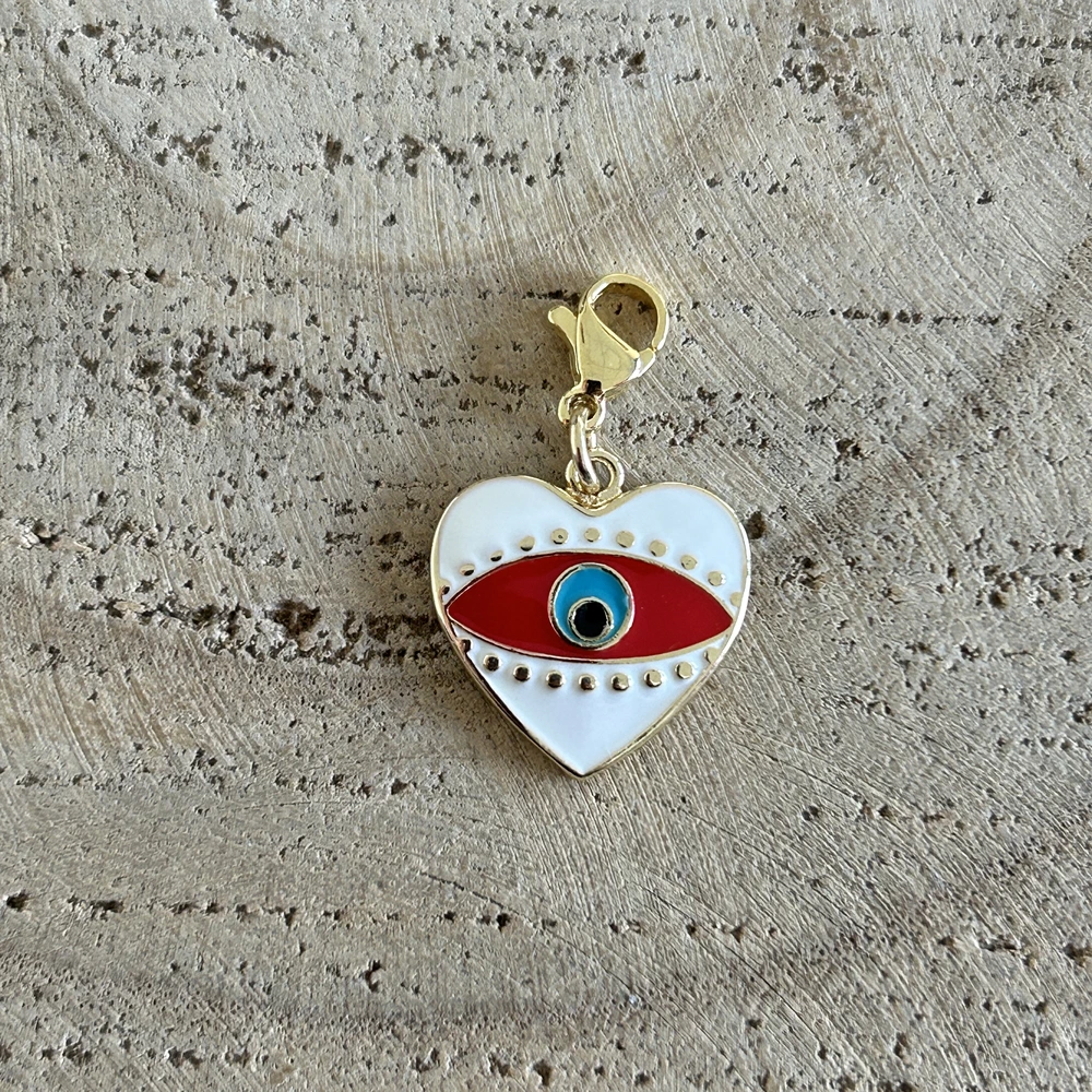 Grigri charm coeur oeil blanc & rouge