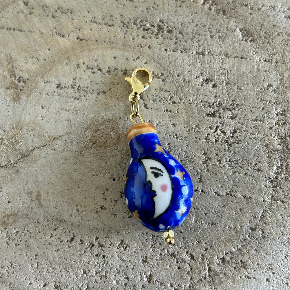 Grigri charm fiole en porcelaine lune